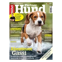 Titelbild des Magazins Partner Hund mit einem Beagle, der durch Wasser läuft und spritzt. Schlagzeilen wie „Abenteuer Gassi“ und „Reaktiver Hund“ sind sichtbar.