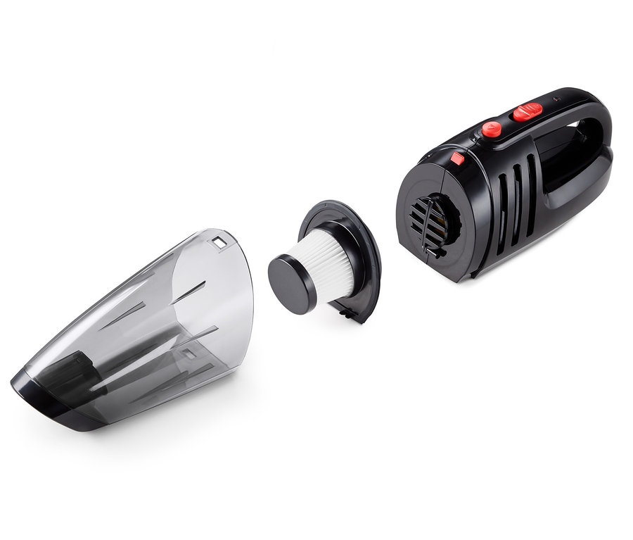 Ein zerlegter Autostaubsauger auf weißem Hintergrund.