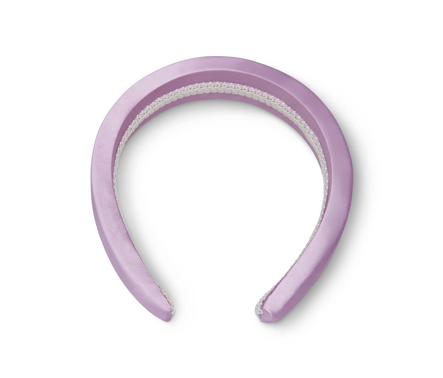 Ein lila Haarreif auf einem weißen Hintergrund.