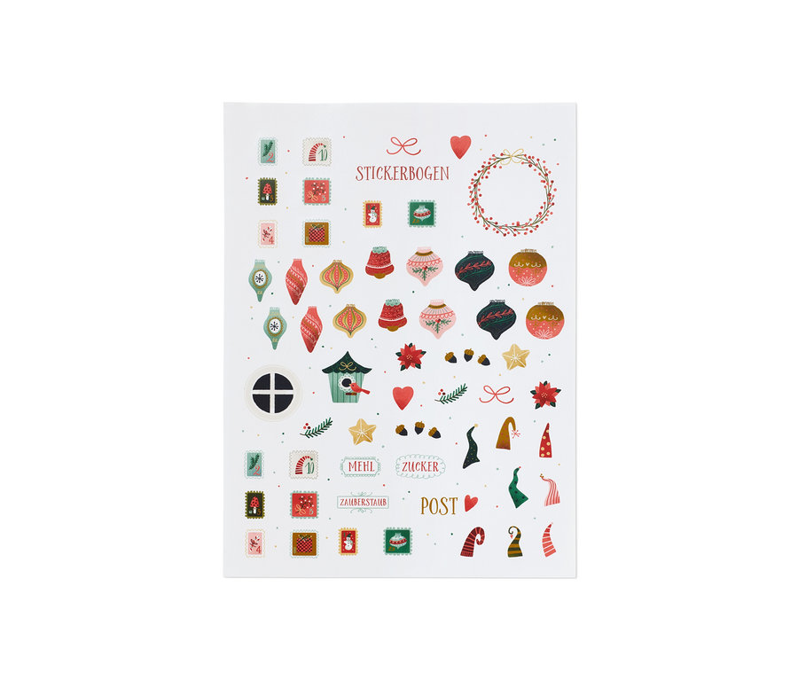 Ein Stickerbogen mit weihnachtlichen Motiven wie Christbaumkugeln, Tannenbäumen und Schriftzügen.
