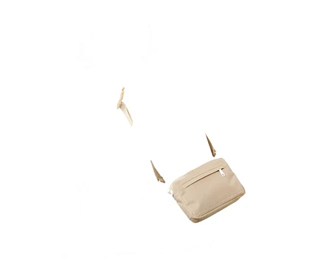 Eine beige Sicherheits-Gürtel- und Umhängetasche hängt in der Luft.
