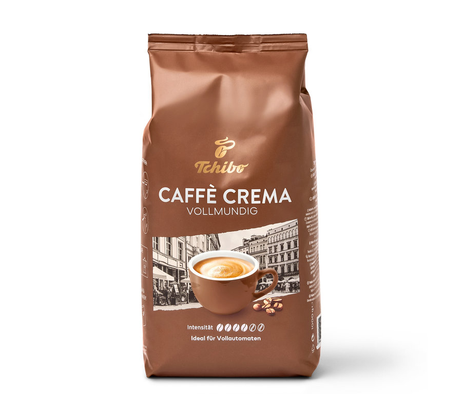 Braune 1 kg Packung Tchibo Caffè Crema Vollmundig ganze Bohne mit Abbildung einer Kaffeetasse und Bohnen.