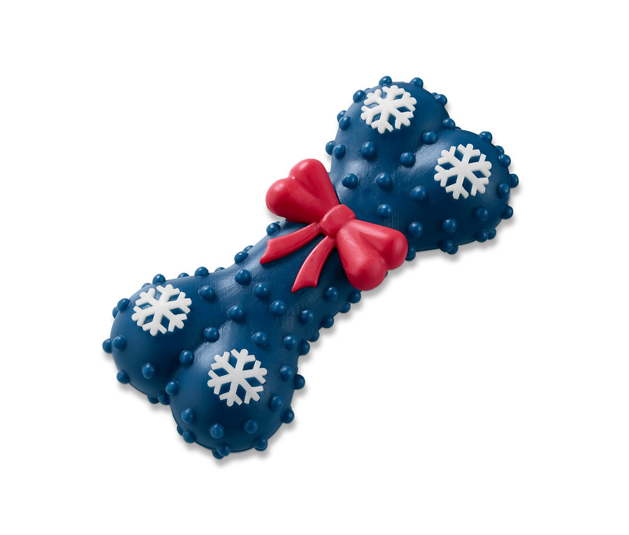 Blaues Hunde-Spielzeug in Knochenform mit roter Schleife und weißen Schneeflocken.