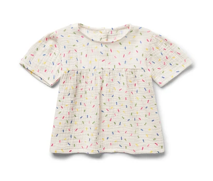 Kinder-Musselin-Bluse mit bunten Streuseln.
