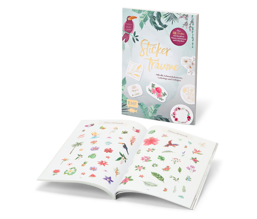 Zwei offene Bücher »Stickerträume« mit Aufklebern.