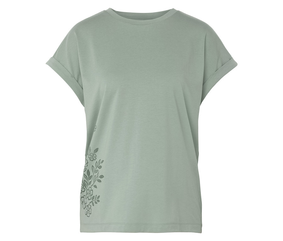 Ein hellgrünes T-Shirt mit Blumenmuster auf der linken Seite.
