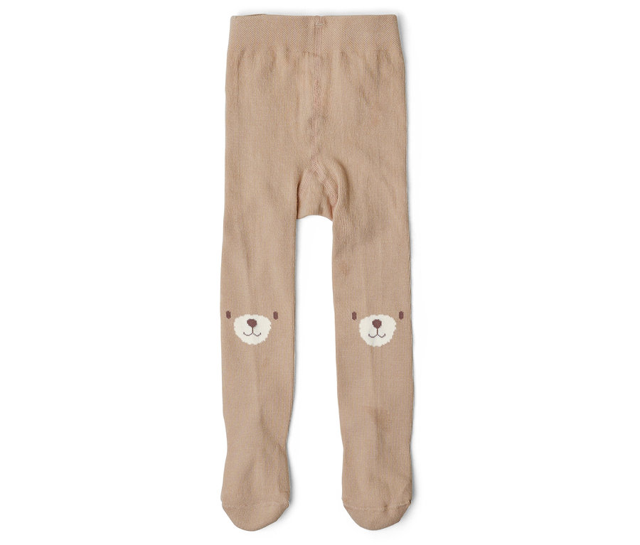 Beige Kinderstrumpfhose mit Bärengesichtern auf den Knien, flachliegend.