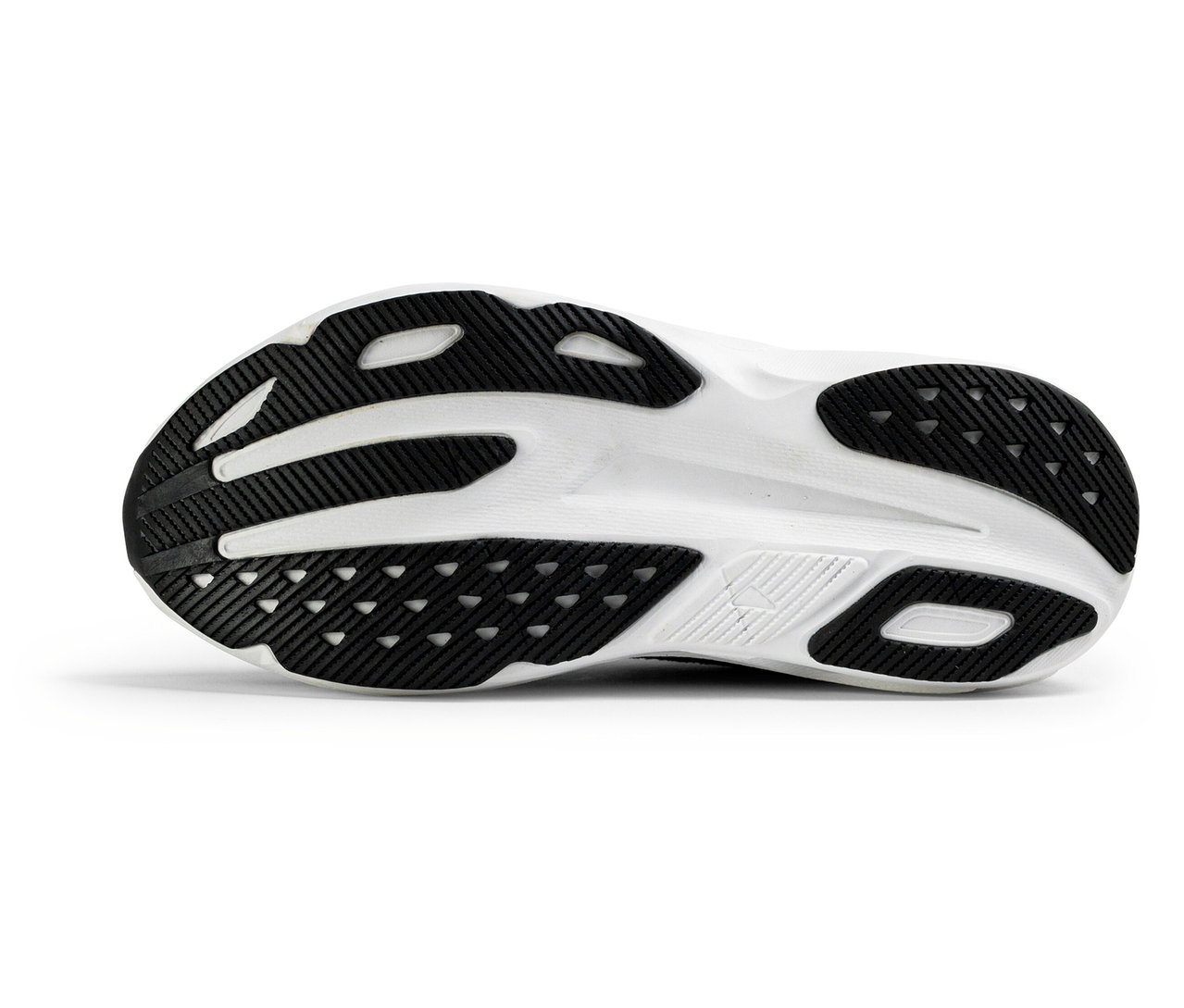 Sohle eines schwarz-weissen FILA Retron Herren-Sneakers, mit schwarzem Profil und weisser Zwischensohle.