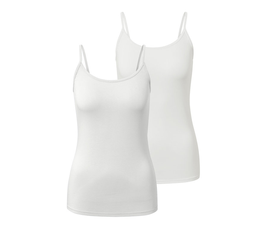 Zwei weiße Hemdchen mit dünnen Trägern.