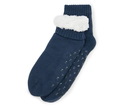Ein Paar marineblaue Socken mit rutschfester Sohle und weißem Rand.