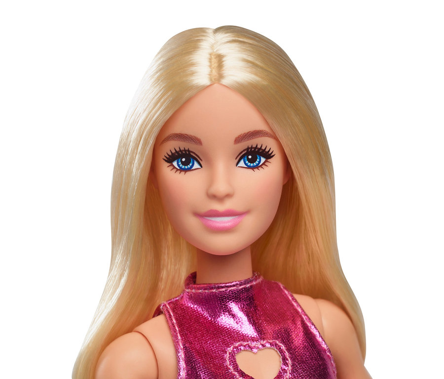 Nahaufnahme einer blonden Barbie-Puppe in einem glitzernden, pinkfarbenen Kleid mit Herzausschnitt.