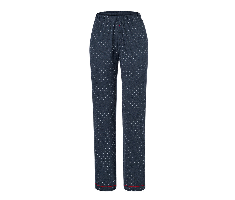Eine lange Pyjamahose mit weißen Punkten auf marineblauem Hintergrund.