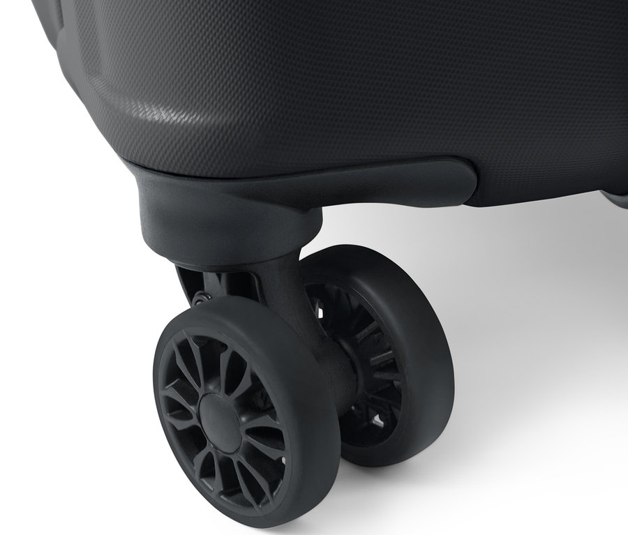 Detailansicht eines kleinen Hartschalen-Koffers und seiner Rollen.