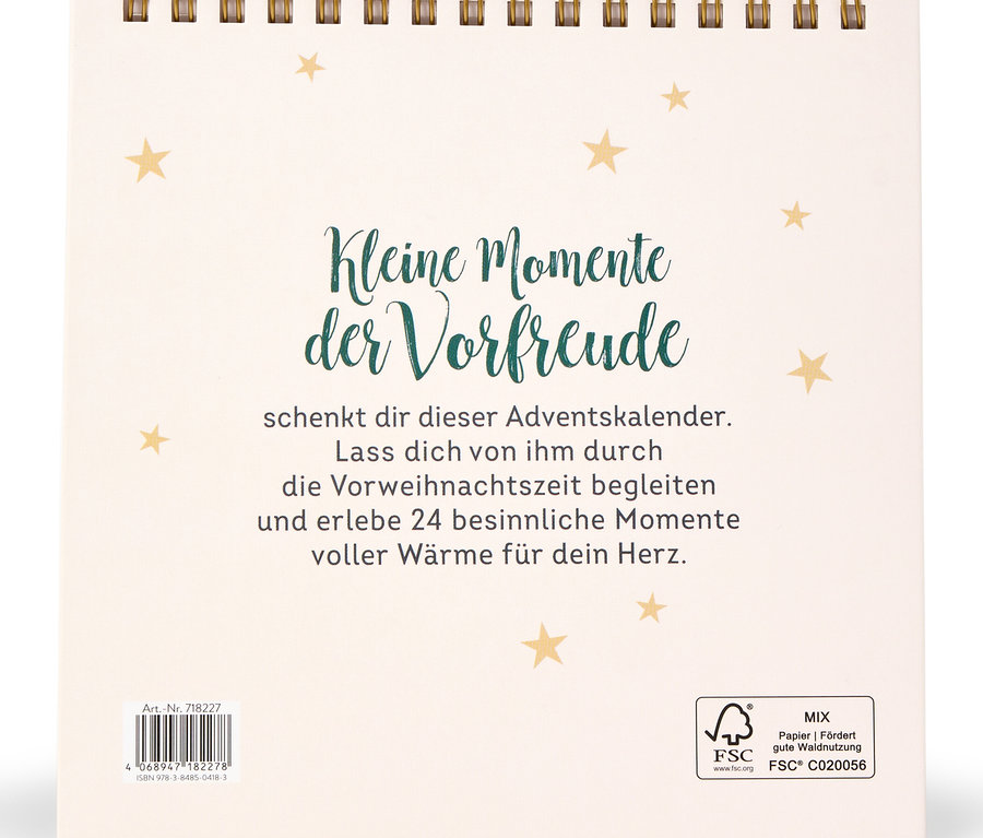 Weißer Kalender mit der Aufschrift "Kleine Momente der Vorfreude" und goldenen Sternen.