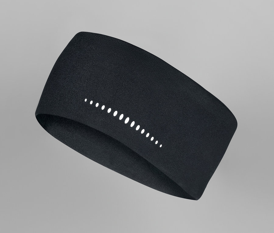 Schwarzes Sport-Stirnband mit reflektierenden Elementen auf grauem Hintergrund.