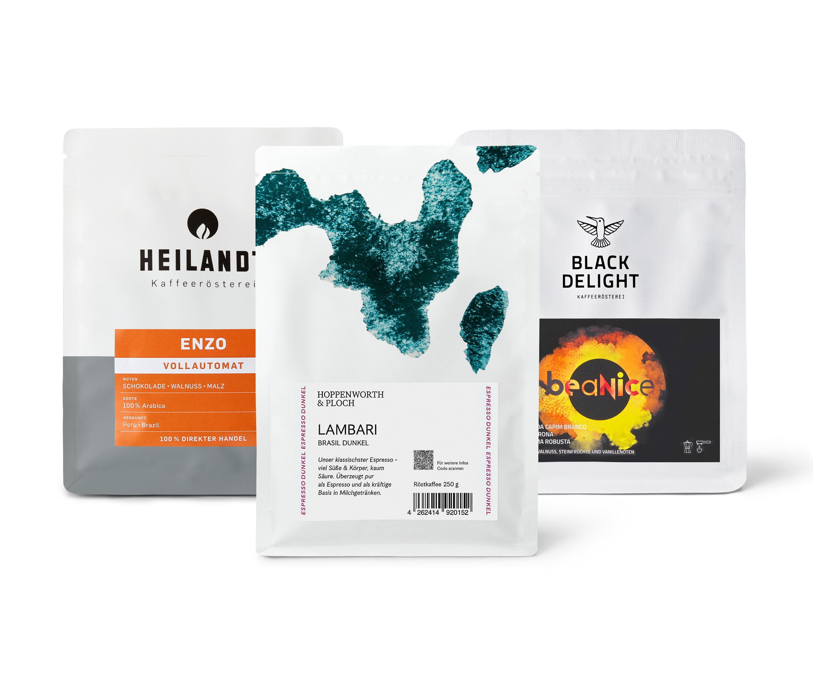 Drei Kaffeepackungen des "Vollautomaten Probierpaket "Caffè Crema Entdecker Set" - 3x 250 g Ganze Bohne" liegen auf einem Tisch.