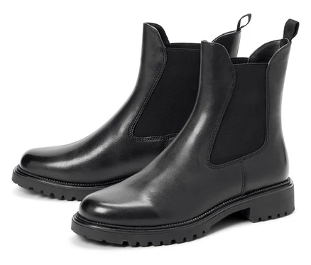 Zwei schwarze Chelsea Lederstiefel mit elastischen Seiteneinsätzen und einer robusten Sohle.