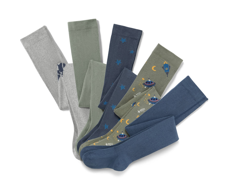 Fünf Baumwoll-Strumpfhosen, Outerspace, sind ausgebreitet.