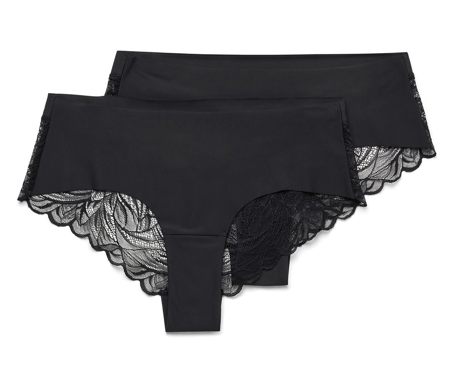 Zwei schwarze Unterhosen mit Spitzenbesatz liegen übereinander.