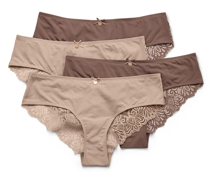 Nahaufnahme von fünf Unterhosen in Braun- und Beigetönen, die mit Schleifen und Spitze verziert sind.