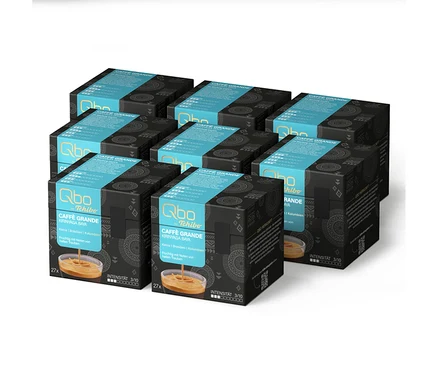 Neun schwarze und türkise Qbo by Tchibo Kaffeekapselboxen „CAFFÈ GRANDE KIRINYAGA BAYA“ (27 Kapseln, Intensität 3/10), 3x3 angeordnet.