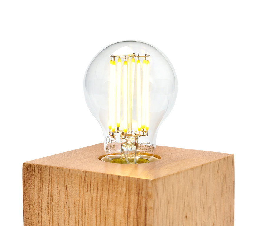 LED-Leuchtmittel E27 auf einem Holzsockel.