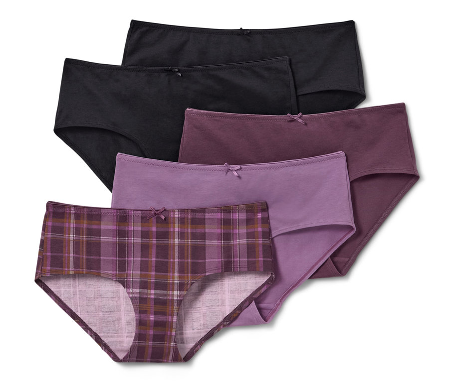 Fünf Pantys in Schwarz, Lila und kariert.