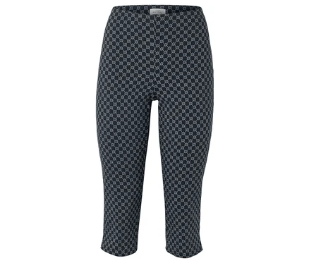 Eine marineblaue Caprihose mit einem sich wiederholenden weißen geometrischen Muster.