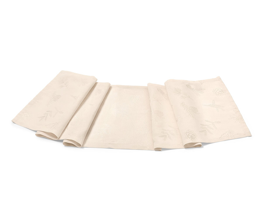 Beiger Jacquard-Tischläufer, mehrfach gefaltet.