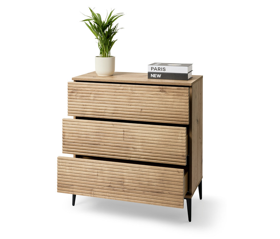 Kommode mit drei Schubladen und einer Topfpflanze.