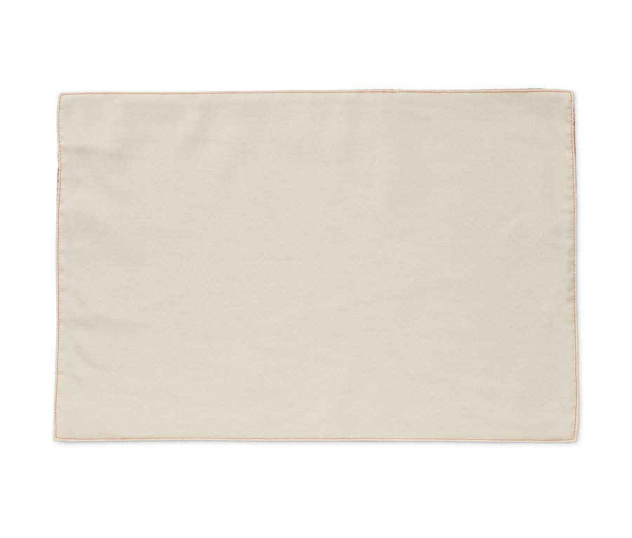 Detail eines beigen Wende-Platzsets.