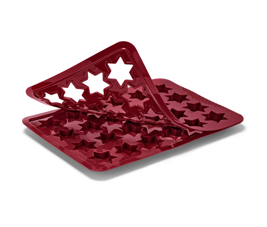 Detailaufnahme einer roten Zimtstern Backmatte aus Silikon.