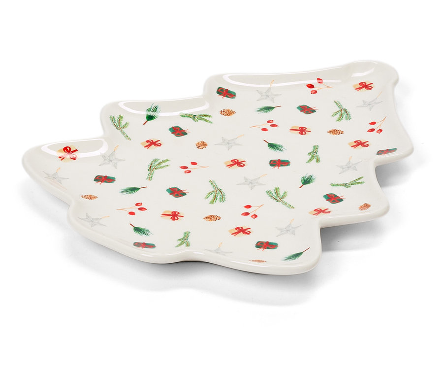 Weißer Teller in Form eines Weihnachtsbaums mit Weihnachtsmotiven.