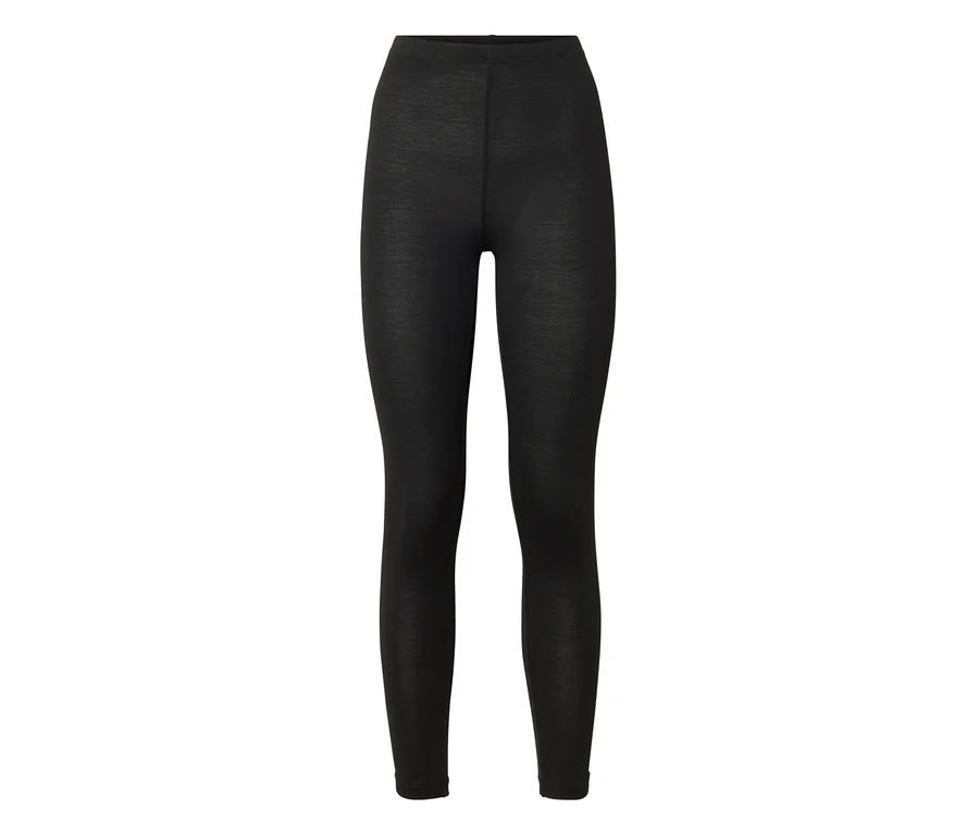 Lange, hoch geschnittene schwarze Leggings aus Feinstrickstoff.