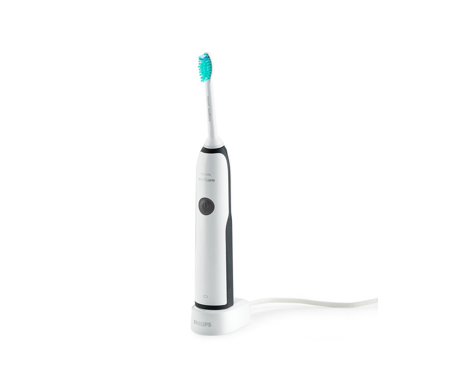 Elektrische Schallzahnbürste Philips Sonicare CleanCare+ HX3212/56 auf einer Ladestation.