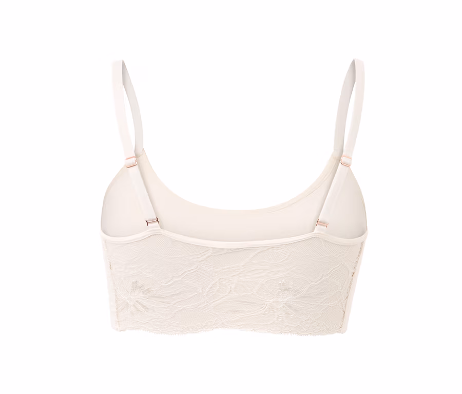 Detailaufnahme eines creme-farbenen Seamless-Bustiers mit Spitze von hinten.