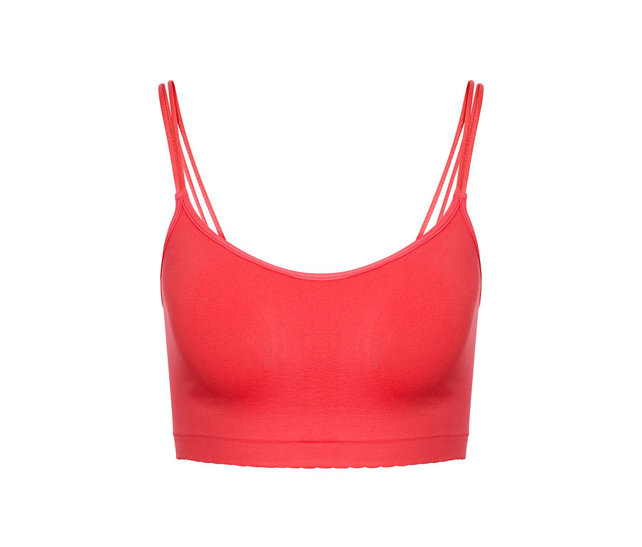Ein korallfarbenes Seamless-Bustier mit Spitze.