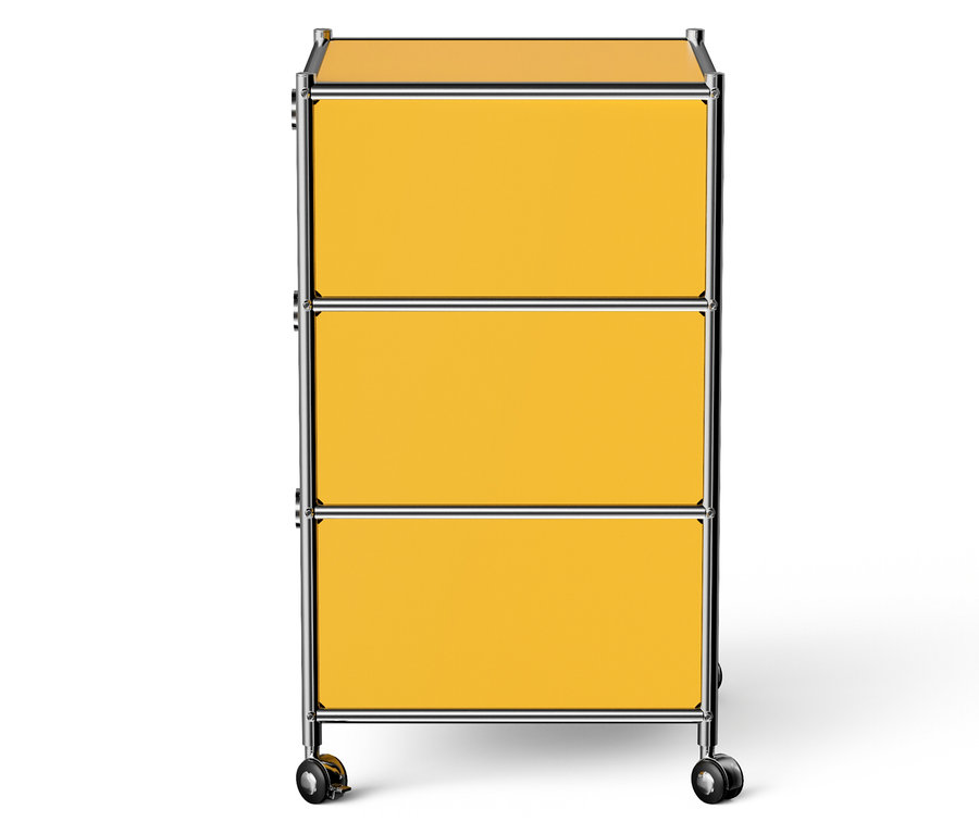 Gelber Rollcontainer mit drei Schubladen.