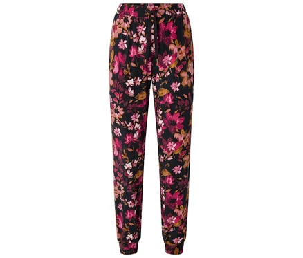 Hose mit Gummizugbund und pinkfarbenem Blumenmuster auf schwarzem Grund.