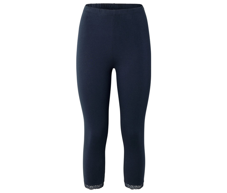 Dunkelblaue, knielange Leggings mit Spitzenbesatz am Saum.