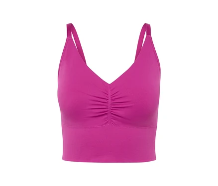 Detailansicht eines pinkfarbenen Sport-BHs mit dünnen Trägern.