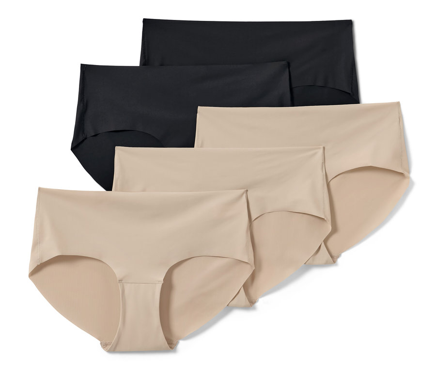 Fünf Magic-Cut-Pantys in Schwarz und Beige.