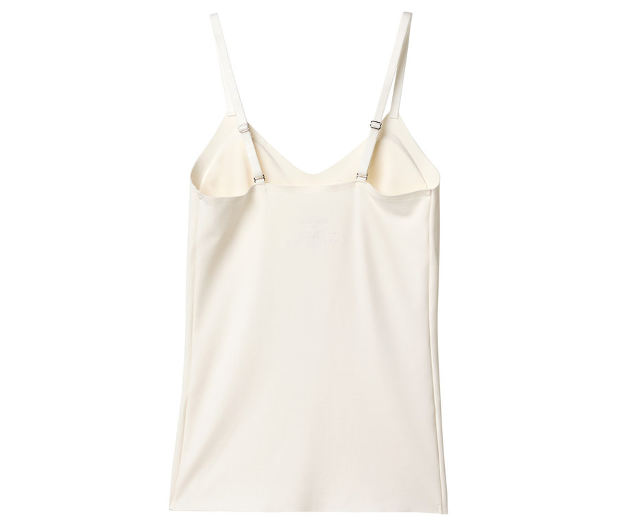 Elfenbeinfarbenes Tanktop mit Spaghettiträgern, von hinten fotografiert.
