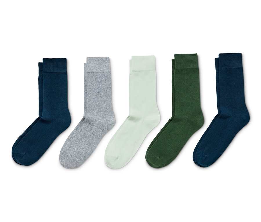 Fünf Paar mehrfarbige Socken.
