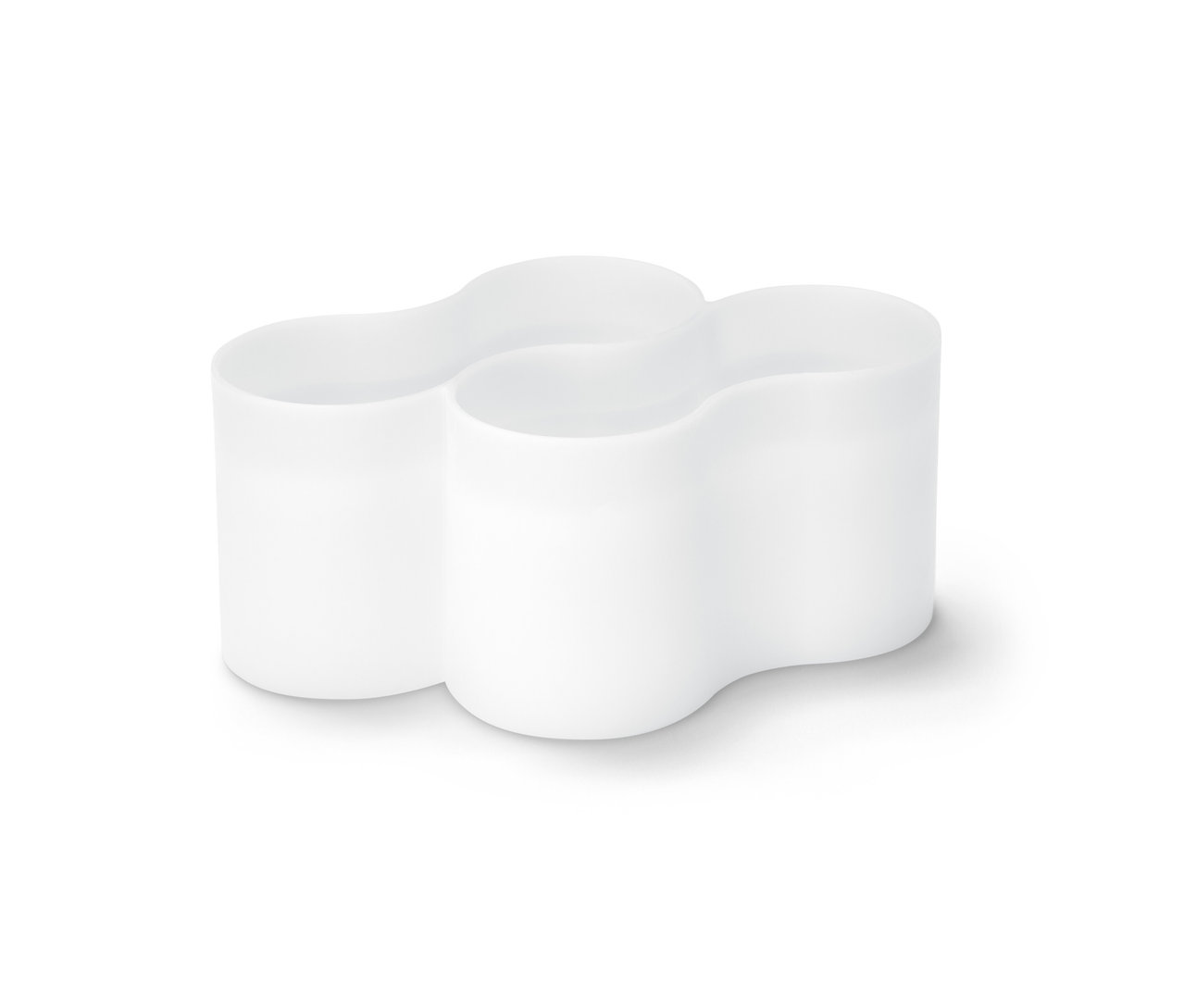 Weißer Tubenhalter mit drei Fächern.