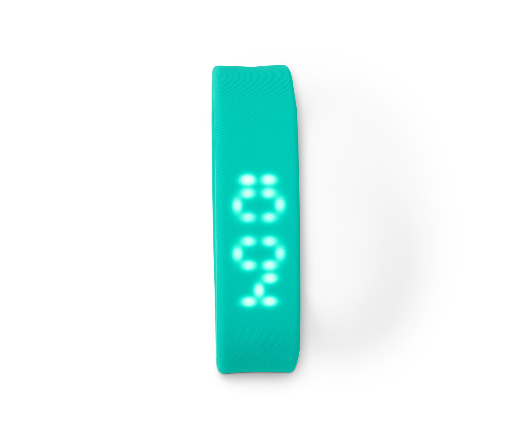 Türkiser Schrittzähler mit Uhr auf weißem Hintergrund.