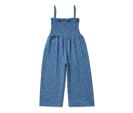Blauer Jumpsuit in 7/8-Länge mit farbigem Muster.