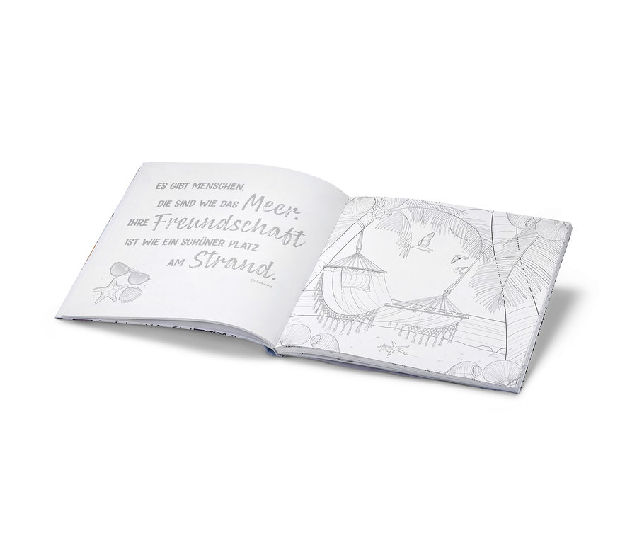 Offenes Buch »Oase der Ruhe – ausmalen und entspannen« mit Strandbildern und Text.
