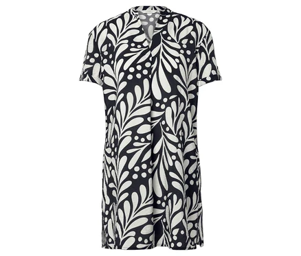 Ein schwarzes Kleid mit weißen Blättern und Punkten.
