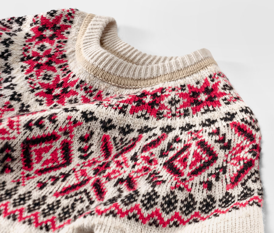 Detailansicht eines Kinder-Norweger-Strickpullovers.